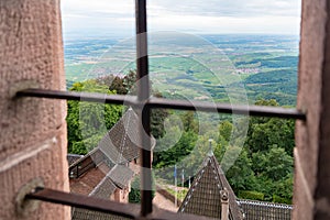 Haut-Koenigsbourg castle glimpse trough a window photo